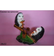 Ежик на качелях